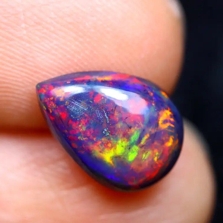 Ethiopian Welo - Smoked Opal "Ember Veil" - (10.8 x 7.6 x 3.8 mm - 1.58 carat)