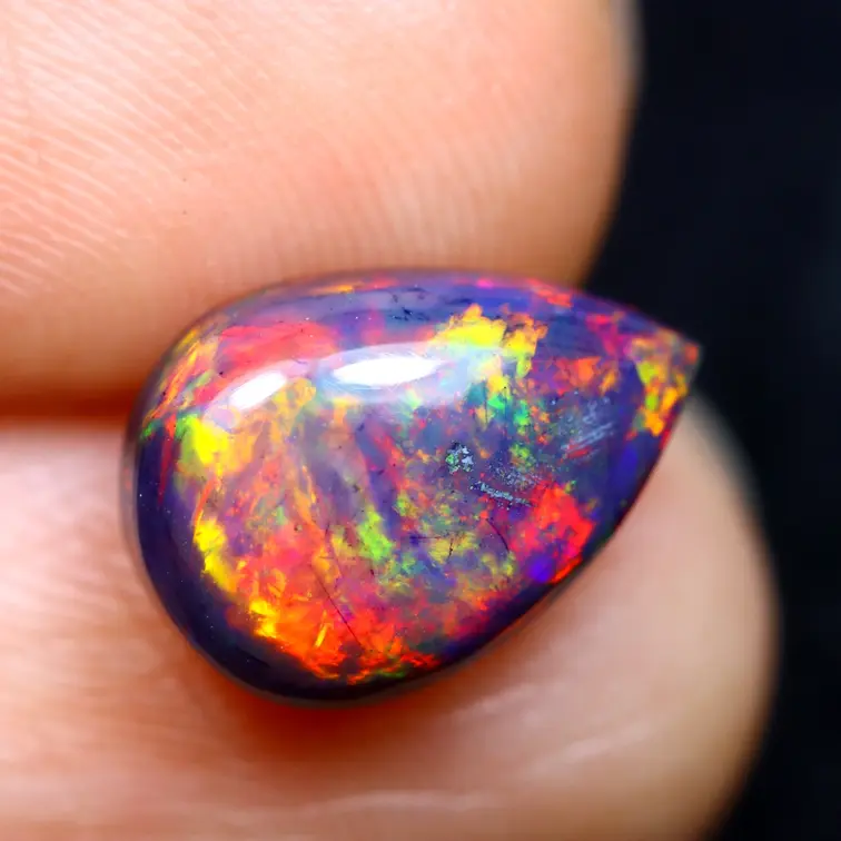 Ethiopian Welo - Smoked Opal "Ember Veil" - (10.8 x 7.6 x 3.8 mm - 1.58 carat)