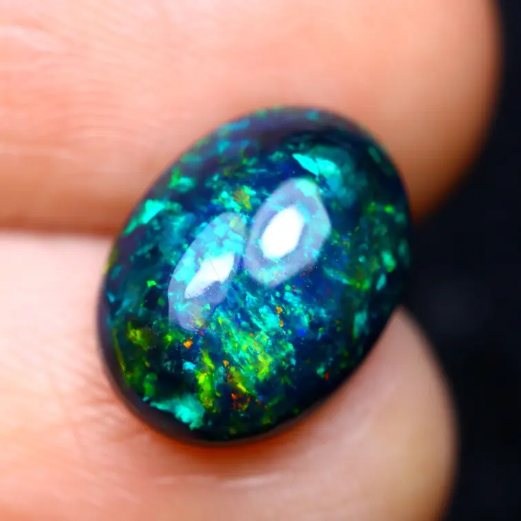Ópalo Welo Etíope - Ópalo Ahumado "Smoky Aurora" - (10.8 x 8 x 4.3 mm - 1.9 quilates)