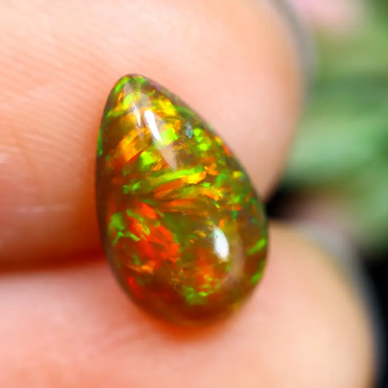 Ethiopian Welo - Smoked Opal "Caramel Ember" - (10.6 x 6.2 x 3.8 mm - 1.29 carat)