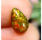 Äthiopischer Welo - Geräucherter Opal "Caramel Ember" - (10.6 x 6.2 x 3.8 mm - 1.29 Karat)