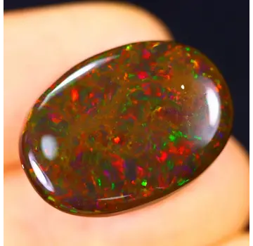 Ethiopische Welo - Gerookte Opaal "Rainbow Nocturne" - (21.9 x 16 x 4.2 mm - 9.44 karaat)