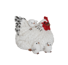 Liggende kip met kuikens