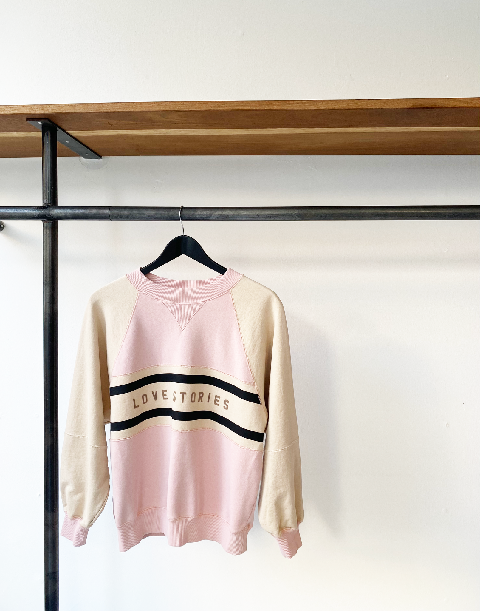 LOVE Stories logo sweater size M