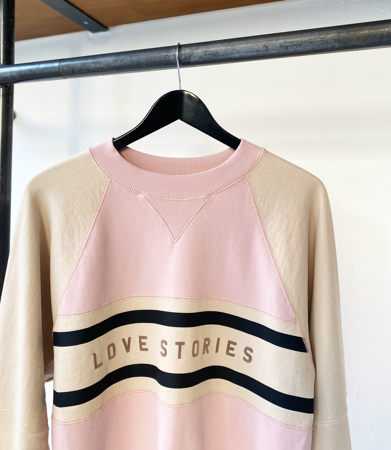 LOVE Stories logo sweater size M