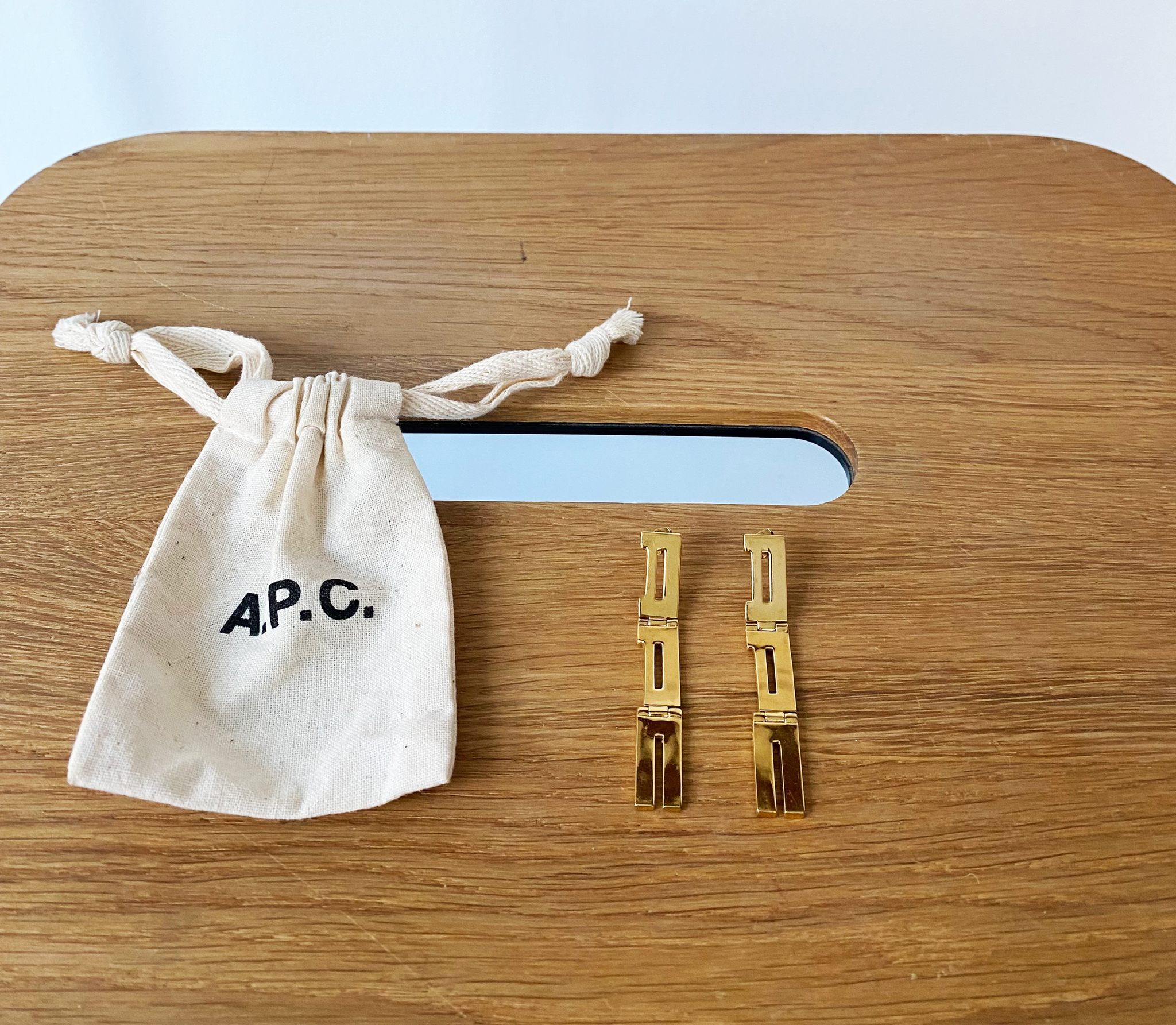 A.P.C. gold logo hardware earrings
