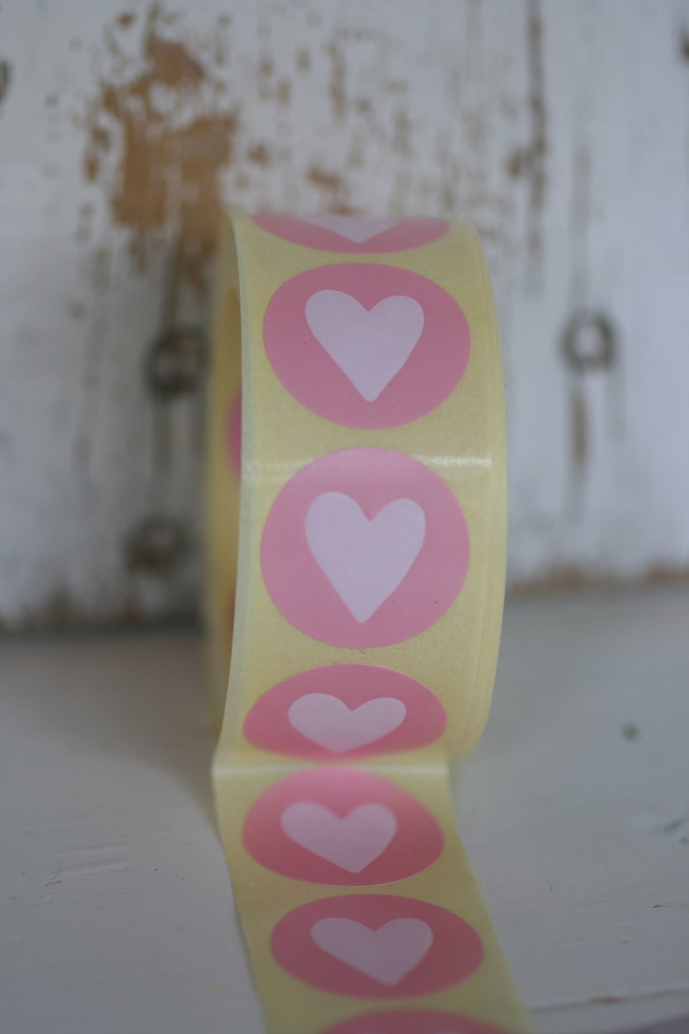 Ronde sticker roze met wit hartje, 10st