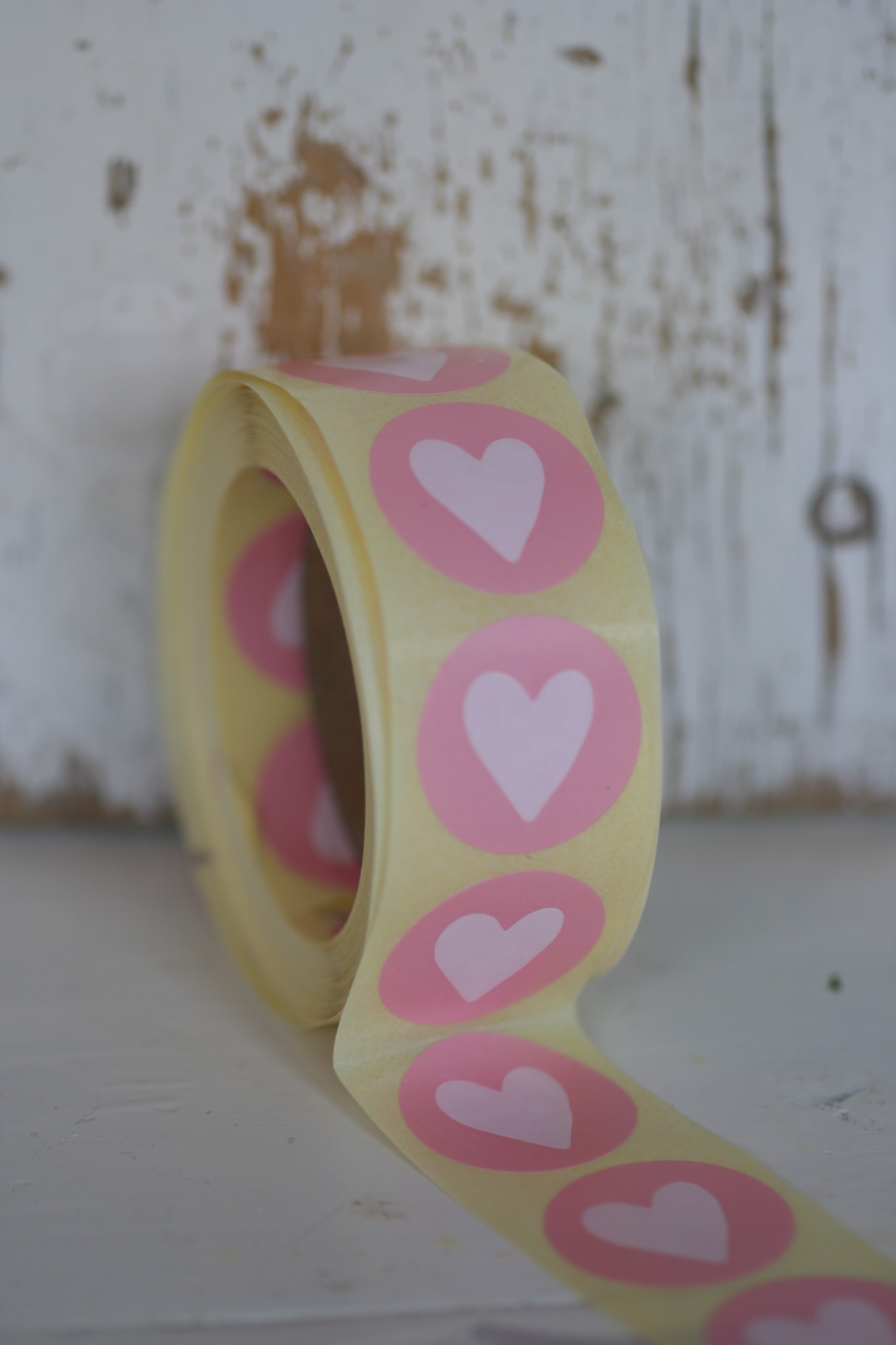 Ronde sticker roze met wit hartje, 10st