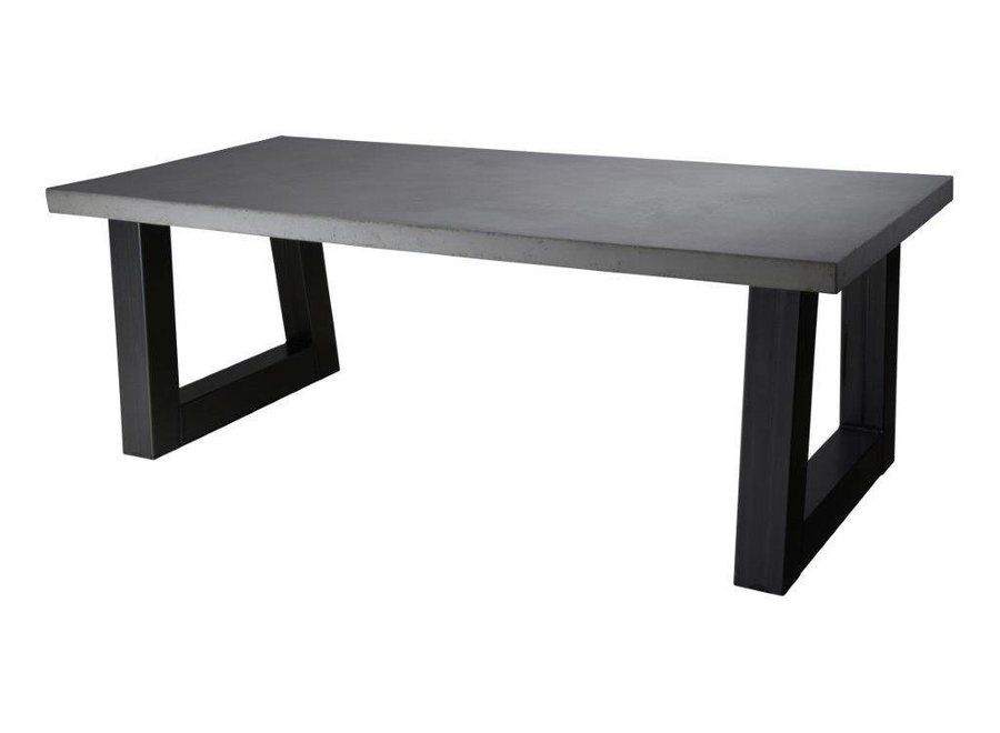 Betonnen tafel met zware stalen trapezium poten