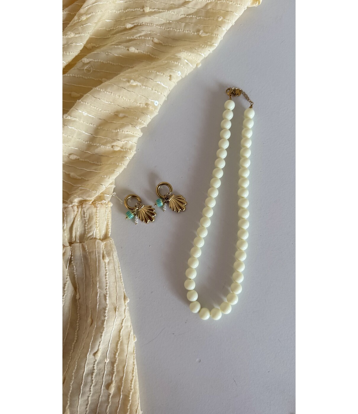 Oorbellen goud/blauw | schelpen