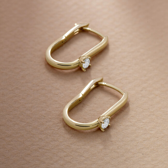 Gouden oorringen met witte solitaire zirkonia