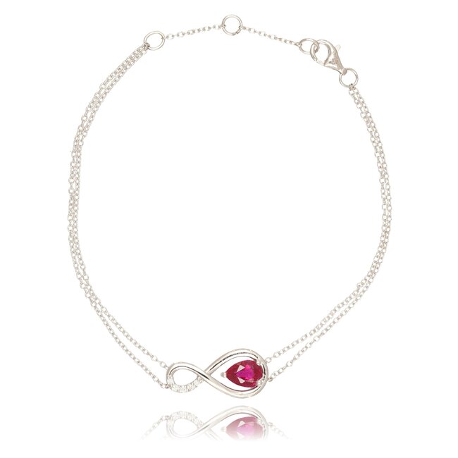 Luxe witgouden infinity armband met peervormige robijn en diamant
