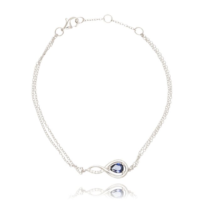 Elegante witgouden infinity armband met peervormige saffier en diamant