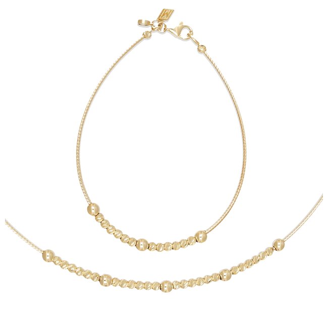 Elegante gouden armband met glanzende dorika balletjes