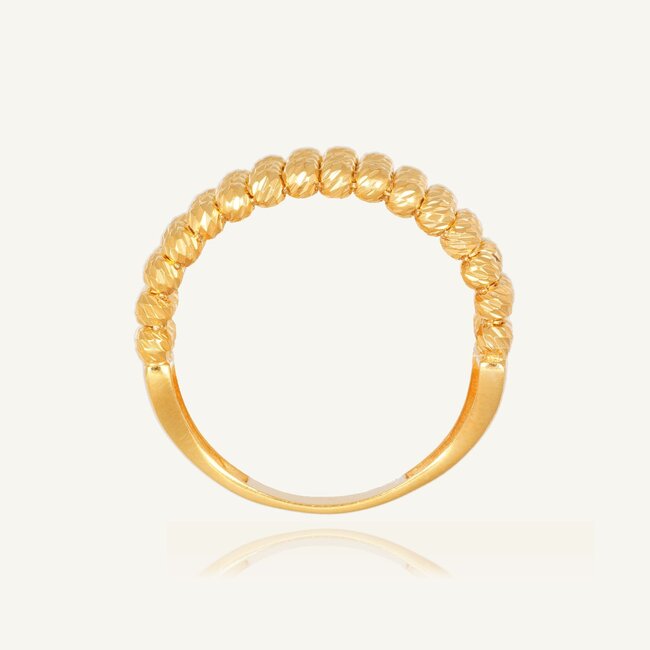 Elegante gouden ring met dorika balletjes