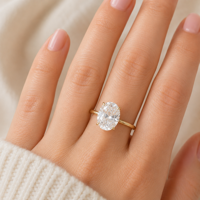 Geelgouden solitaire ring met ovale zirkoni