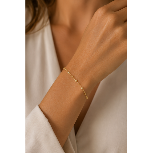 Gouden Dorika Armband met Geslepen Bolletjes