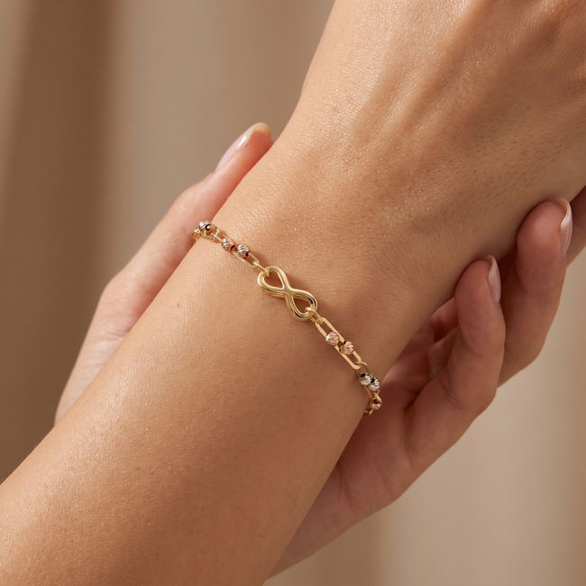 14 karaat gouden infinity armband met bolletjes