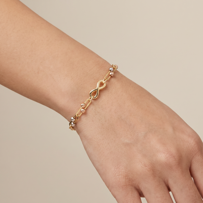 14 karaat gouden infinity armband met bolletjes
