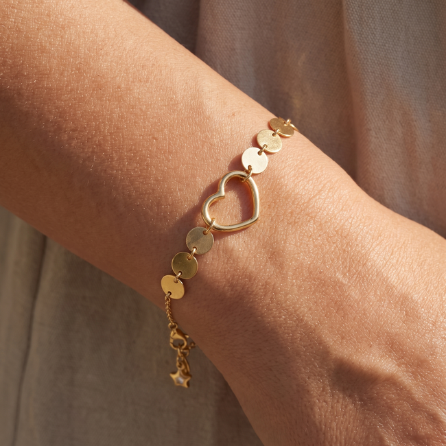 14k gouden armband met hartje en schijfjes