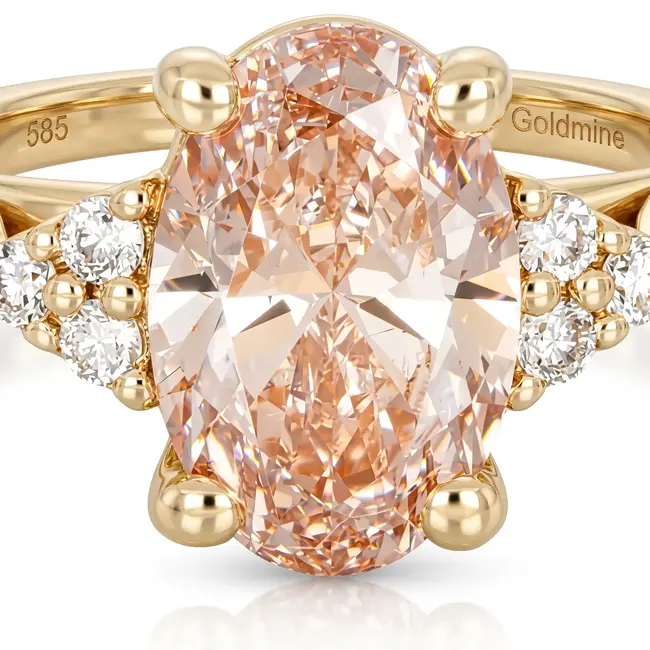 Geelgouden ring 14 karaat met ovale fancy peach diamant 1.03 ct, totaal 1.09 ct