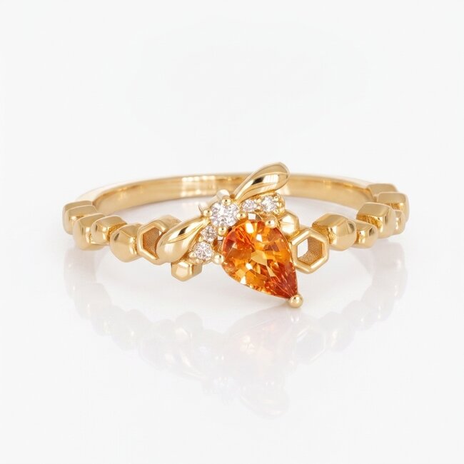 14k gouden bijring, 0,53 ct saffier