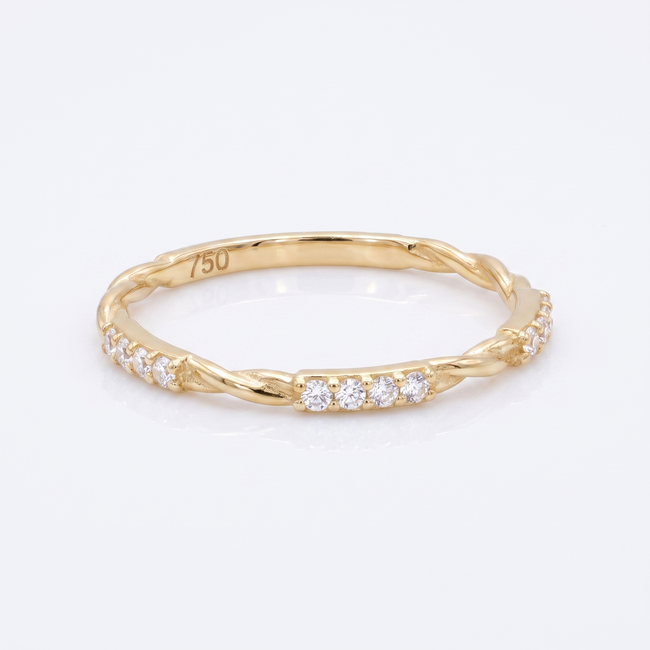 18 karaat geelgouden gedraaide ring met zirkonia