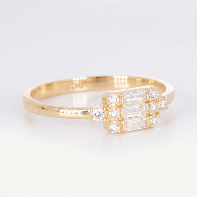 18k geelgouden ring met baguette zirkonia