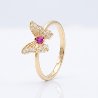 Gouden vlinderring met roze steen