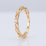 18 karaat geelgouden ring met heldere steentjes en open schakeldesign