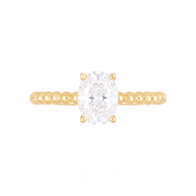 Gouden ovale solitaire ring met bolletjes