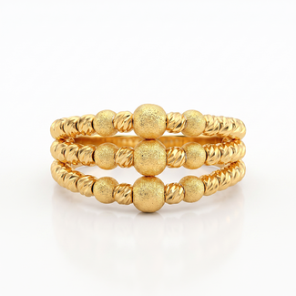 Gouden ring met bolletjes en structuur