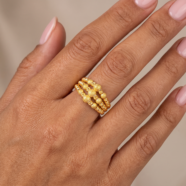 14k gouden ring met verschillende bolletjes