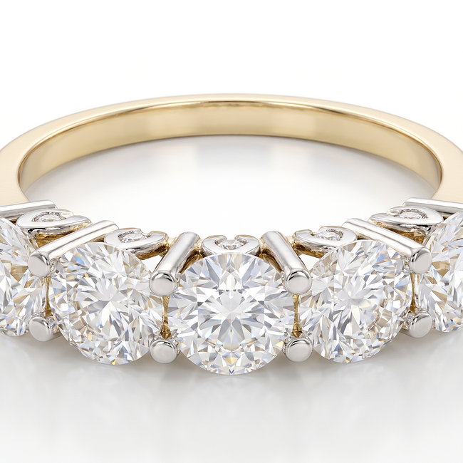 Gouden rijring met vijf ronde Swarovski-stenen
