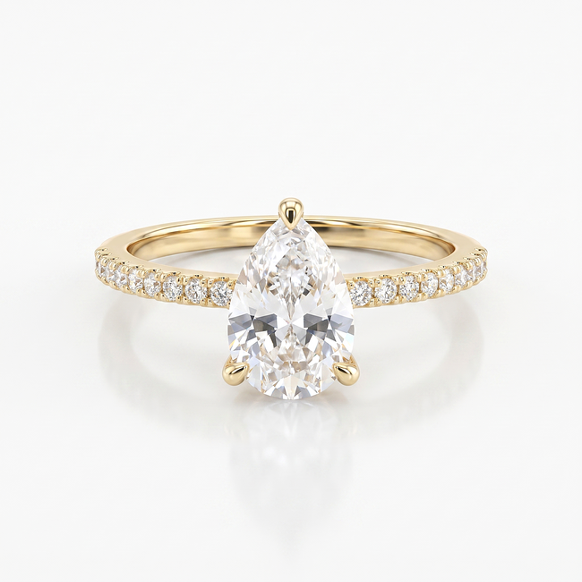 Gouden solitair ring met peervormige Swarovski