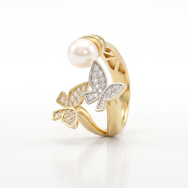 Gouden vlinder ring met parel en zirkonia