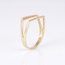 Gouden geometrische ring met open lijnen