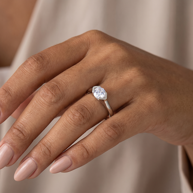 Gouden solitaire ring met zirkonia steen