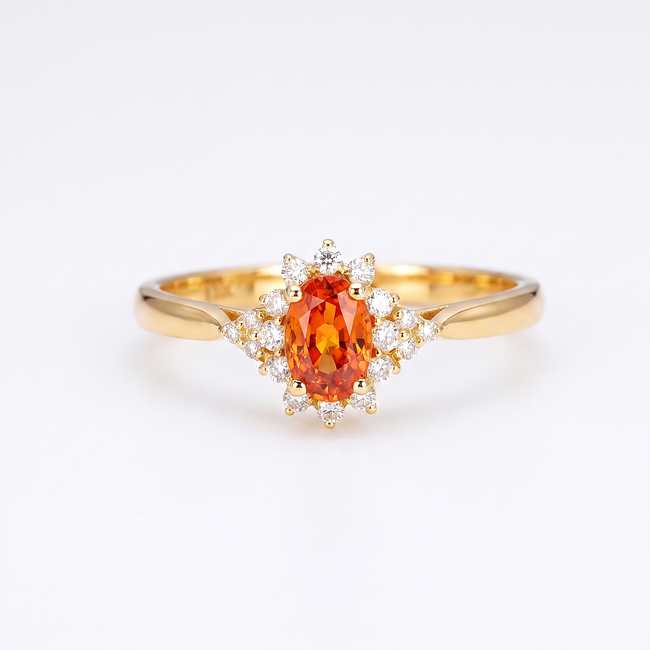 Gouden entourage ring 14 karaat met oranje saffier 0.59 ct