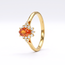 Gouden entourage ring 14 karaat met oranje saffier 0.59 ct