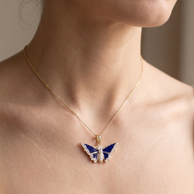 14k gouden vlinder hanger met blauwe emaille