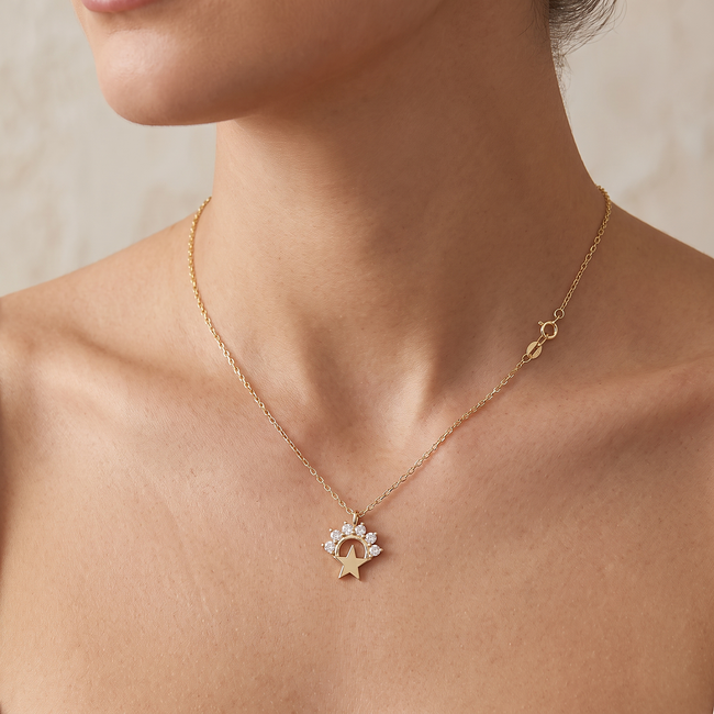 Gouden ster ketting met zirkonia