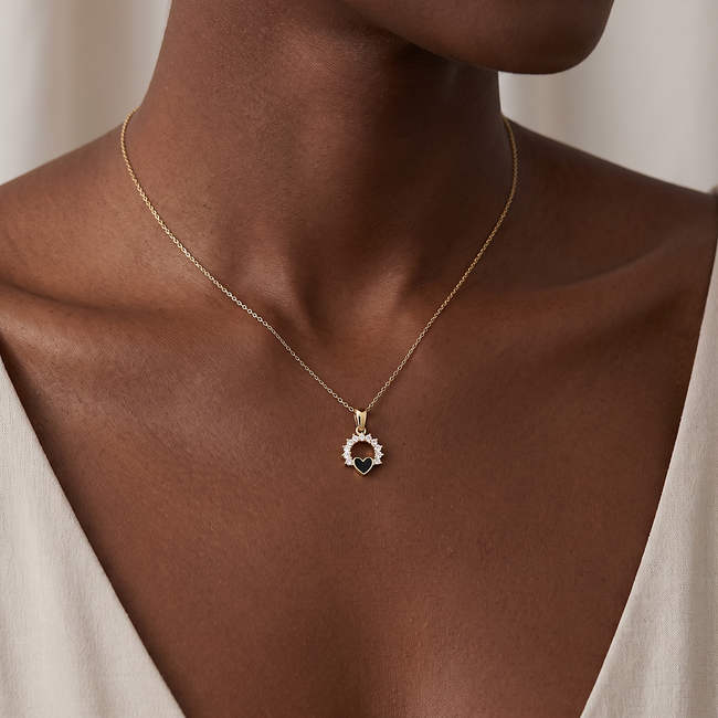 14k gouden collier met zwart hart en zirkonia