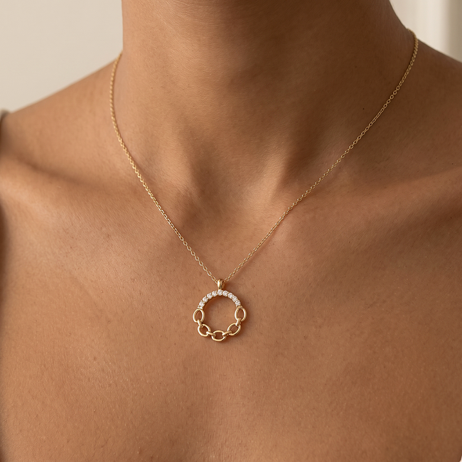 Gouden collier met open cirkel hanger