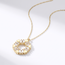 Gouden collier met hartjes en baguette zirkonia