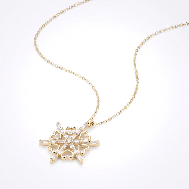 Gouden collier sneeuwvlok met hartjes