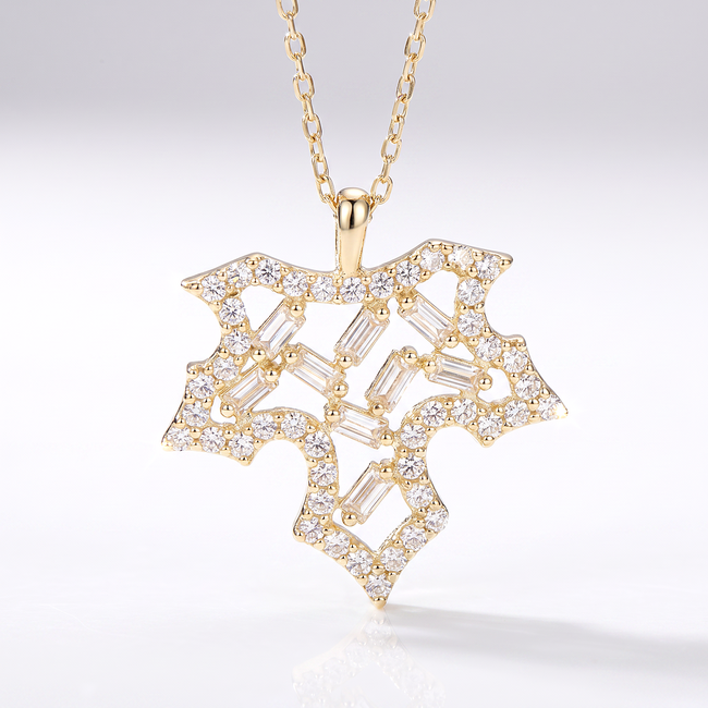 Gouden collier met stervormige hanger