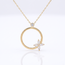 Gouden collier open cirkel met bloem
