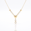 Gouden collier met hartdetails en zirkonia rij
