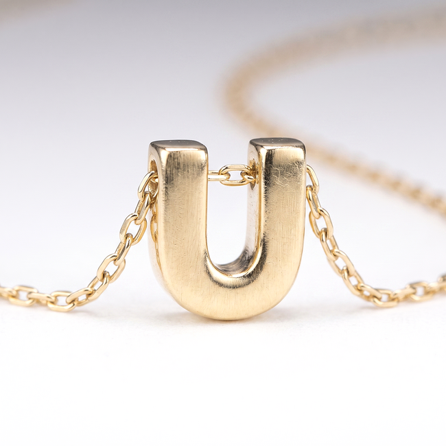 Gouden initialen collier met letter U